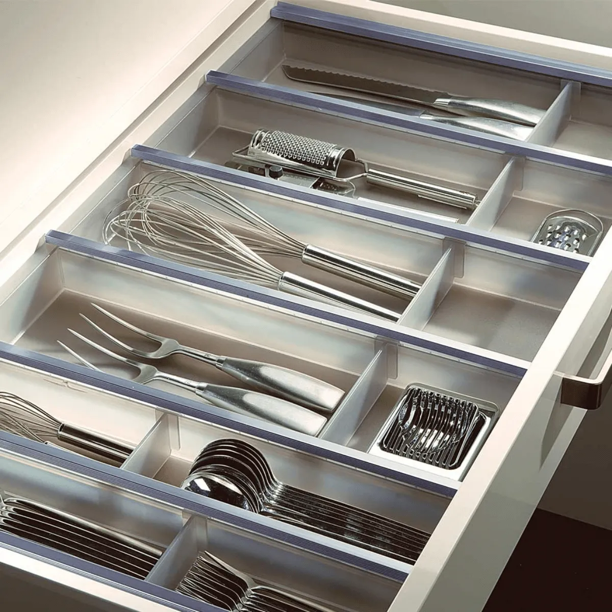Cutlery trays and drawer accessories